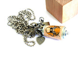 cork necklace squid
